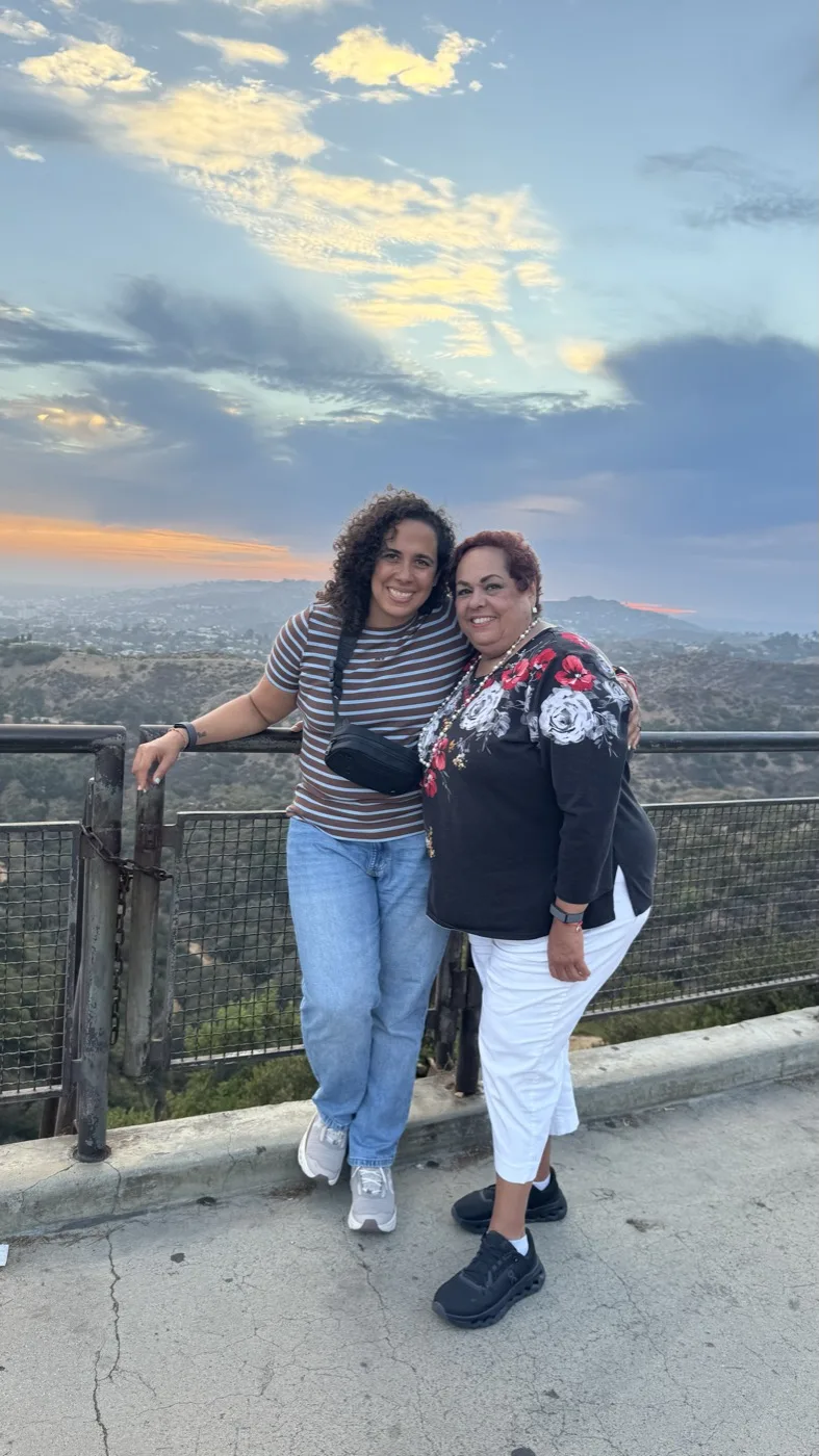 Mariana at a sunset lookout with a friend